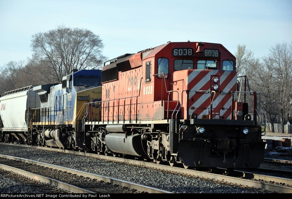 Westbound local waits in the siding
